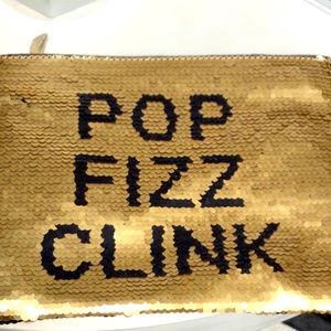 New with tags gold \ black sequins clutch